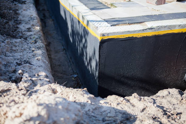 Professional Emergency Waterproofing technician working in Redkey, IN